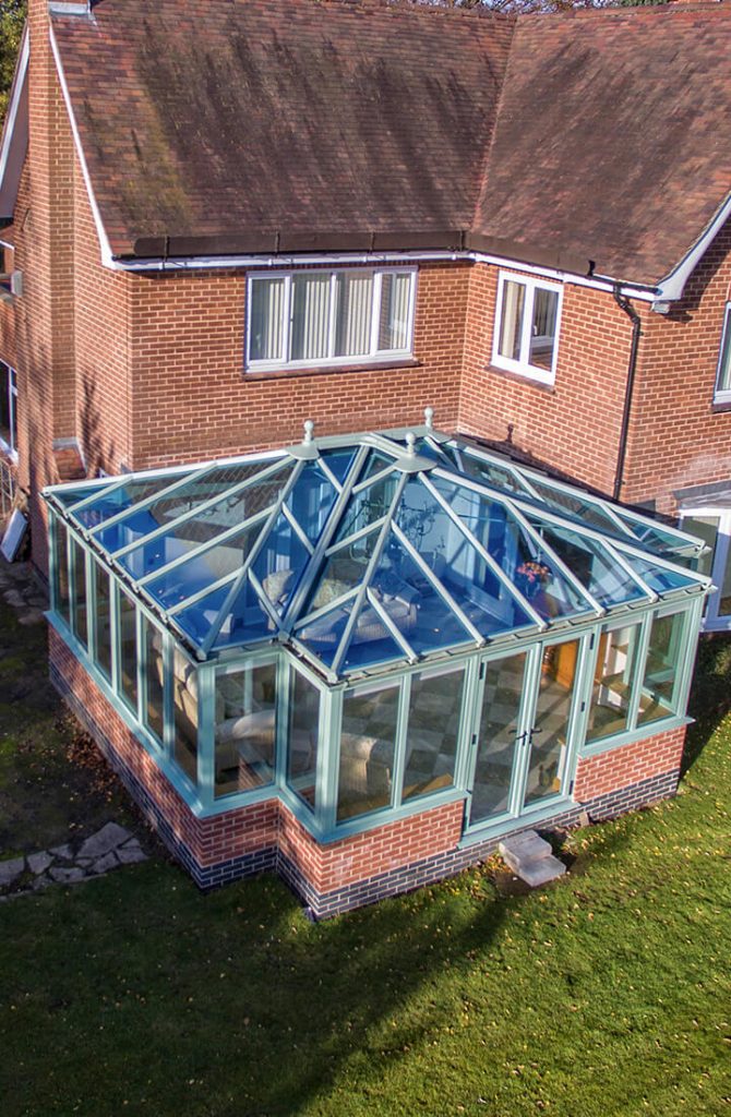 Green uPVC T-Shaped conservatory